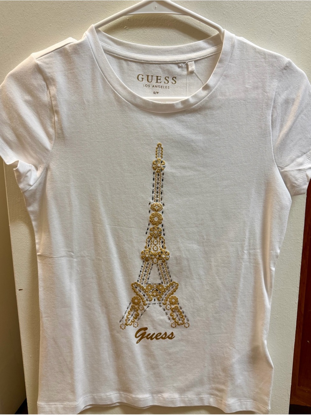 GUESS White Short-Sleeve Tee with Gold Eiffel Tower Embellishment